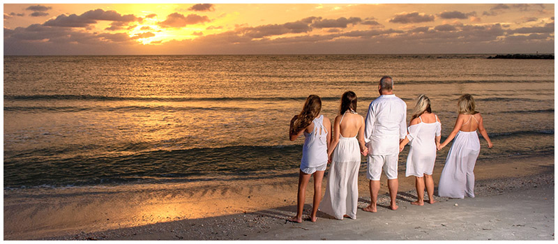 Family looking out towards epic sunset