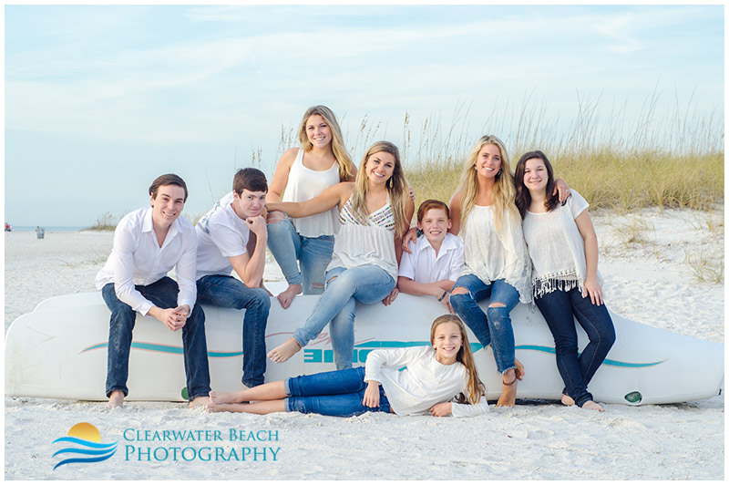Large family photograph on beach boat in clearwater