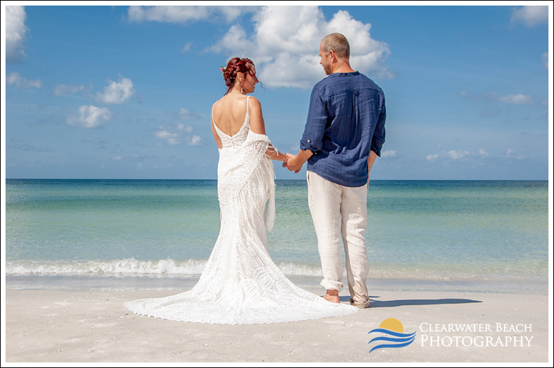 Clearwater Beach Wedding Photographer of Couple looking out