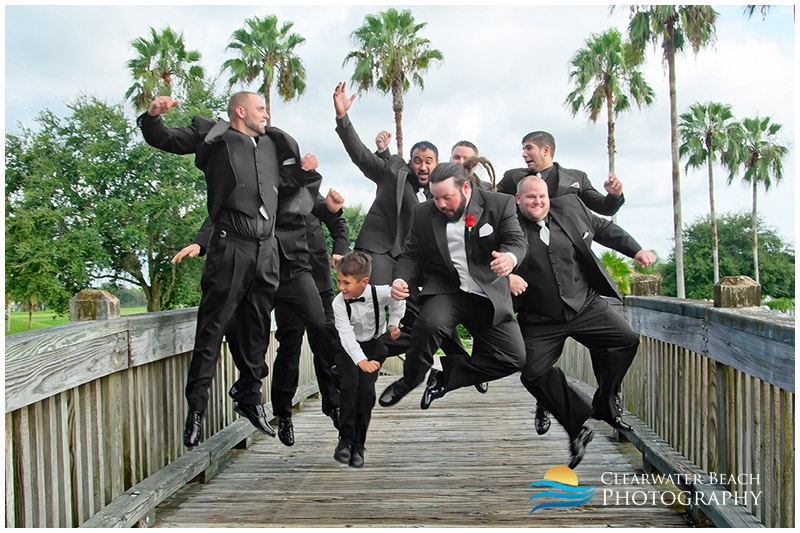 Clearwater Beach Wedding Photopher of Groomsmen Jumping